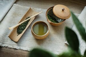 Green tea in wood bowl